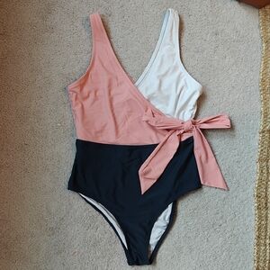 Chic Pink and White Swimsuit with Bow